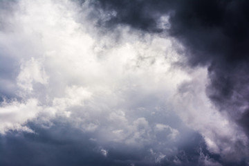 Fototapeta na wymiar Deep Blue Black Dramatic Stormy Clouds Weather Sky Detail Contra