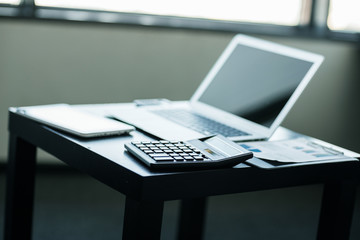 Stylish and classy, the laptop in the workplace.