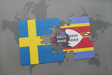 Fototapeta na wymiar puzzle with the national flag of sweden and swaziland on a world map background.