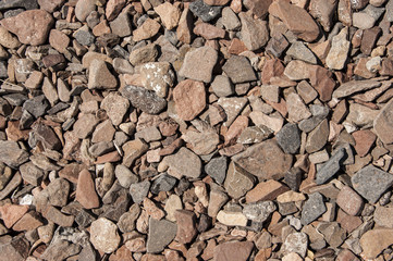 assorted colorful and smooth pebbles from the beach