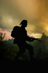 Fototapeta na wymiar Silhouette of American special forces soldier on patrol in the jungle of Vietnam. (Artist illustration)