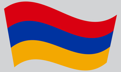 Flag of Armenia waving on gray background