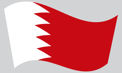 Flag of Bahrain waving on gray background
