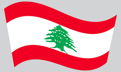 Flag of Lebanon waving on gray background