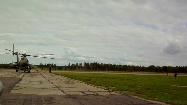 Runway in military airfield at cloudy day