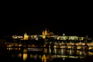 Fototapeta na wymiar Prague Castle, Charles Bridge, Vltava River Illuminated