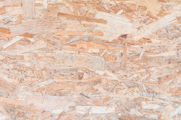 Brown old disorder plywood wall background and texture.