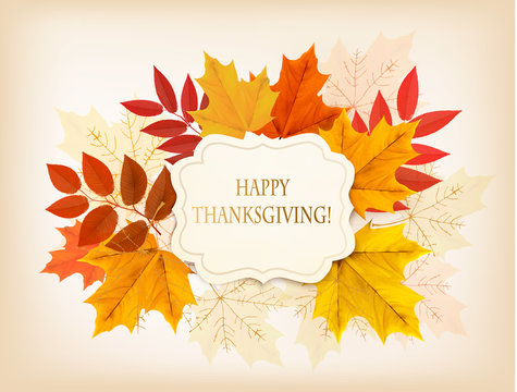 Happy Thanksgiving background with colorful autumn leaves and a