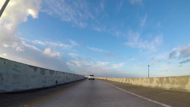 Car driving on a highway overpass HOV lane 2.7k