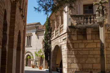 Narrow Spanish street in a hot day