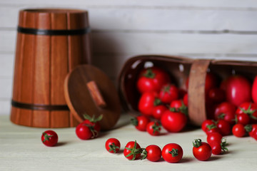 fresh tomato for ketchup on wooden background