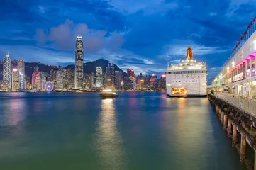 Fotobehang Hong Kong, Victoria Harbor and ferry pier.   © virojsup