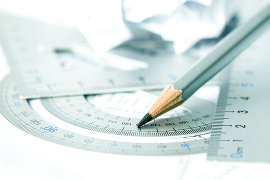 selective focus of pencil with precision measurement tool