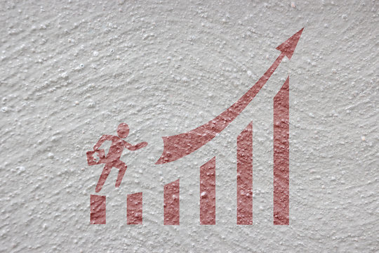 Business Graph, Businessman With A Graph Is Red Paint On Cement Gray Background.