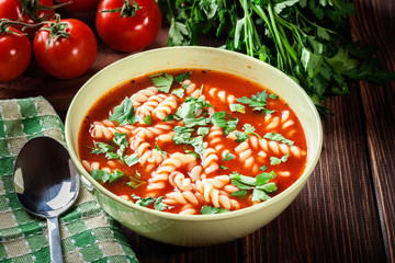 Tomato soup noodles in the bowl