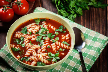 Tomato soup noodles in the bowl