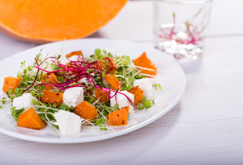 Healthy eating. Warm salad with pumpkin