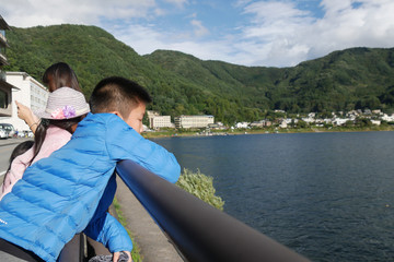 Children looking at Kawaguchigo lake.