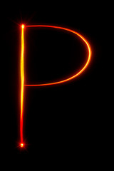 Obraz premium red light painting letter I on black background