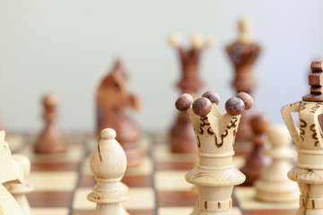 closeup of chess pieces on chessboard