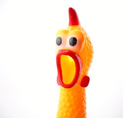 Yellow shrilling chicken with red lips on white background