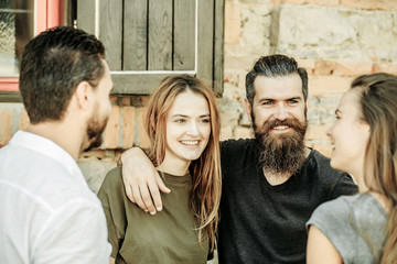 smilling couple with friends