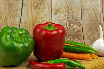 Healthy vegetables on wooden background,close view