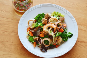 stir fried mixed vegetable with seafood and chili fish sauce