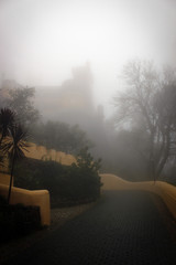 Pena Castle within the clouds and fog, Portugal