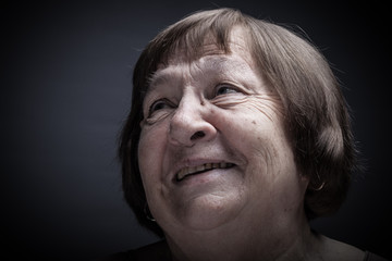 Portrait of elderly woman. Smile. Toned