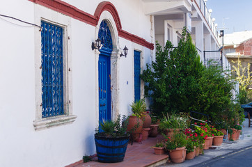 Beautiful blue entrance door to the house in a Mediterranean sty