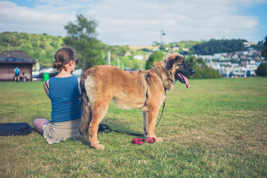 Woman with big dog in the park