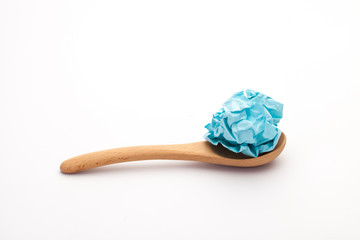 close-up of crumpled paper ball,  blue wadded paper