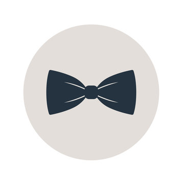Icono plano corbata de lazo en circulo gris 