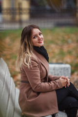 Beautiful girl in autumn Park