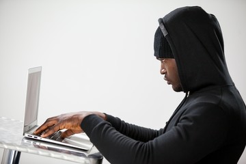 Hacker using a laptop