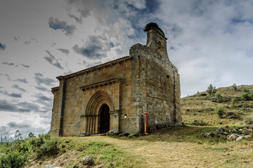 Obraz premium sight of the Romanesque chapel of saint Eulalia in the quarter of Santa Maria in Aguilar de Campoo, Palencia, Castile and León, Spain