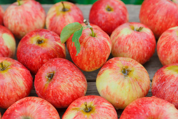 Sweet fresh ripe red apple harvest background