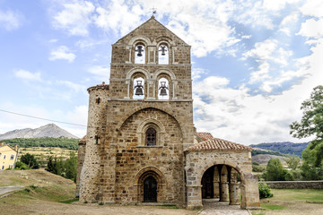 Fototapeta na wymiar sight of the Romanesque collegiate church of San Salvador in Cantamuda, Palencia, Castile and León, Spain