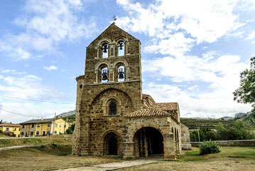 Fototapeta na wymiar sight of the Romanesque collegiate church of San Salvador in Cantamuda, Palencia, Castile and León, Spain