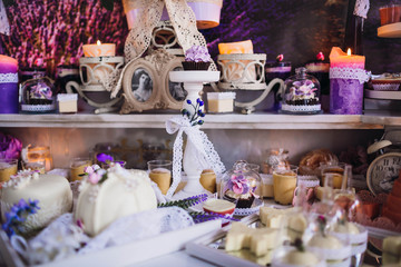 beautiful and delicious candy bar with cookies and cakes