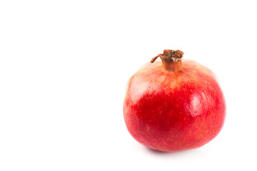 ripe pomegranate on white 