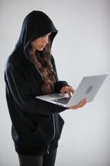 Hacker using a laptop