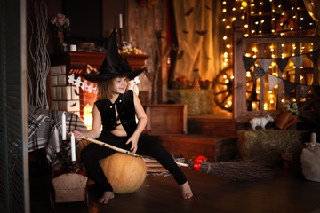Fototapeta na wymiar Girl fairy, witch on broom with pumpkin. Halloween