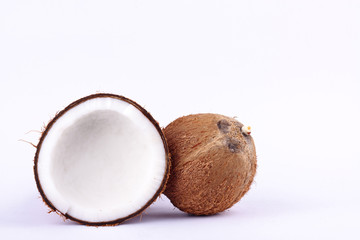 fresh coconut half clipping path for coconut milk and brown coconut shell  on white background fruit food isolated
