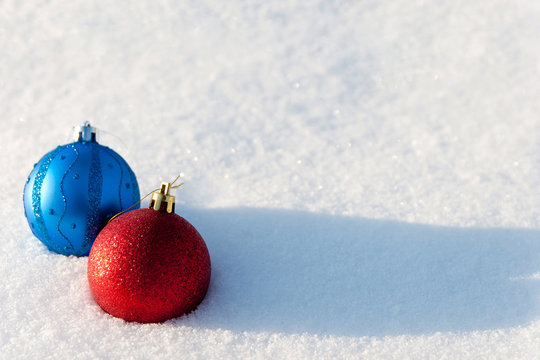Christmas balls on a snow