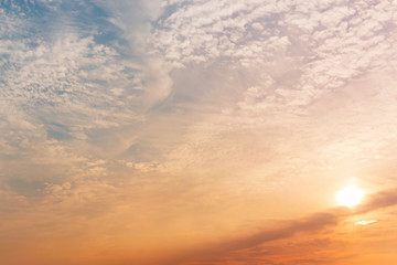Sunset sky with white clouds and bright sky background.