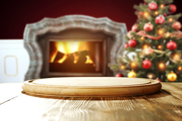 wooden table place and xmas tree 