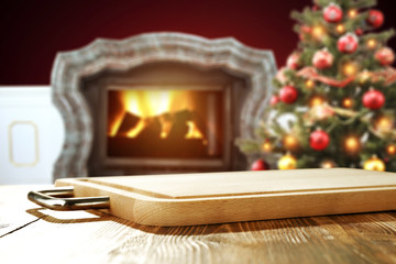 wooden table place and xmas tree 