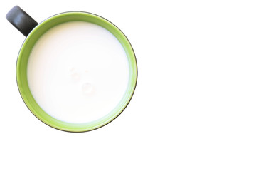 Top view of glass milk green and white in simple glass. Isolated on white background. Round copy space in center.